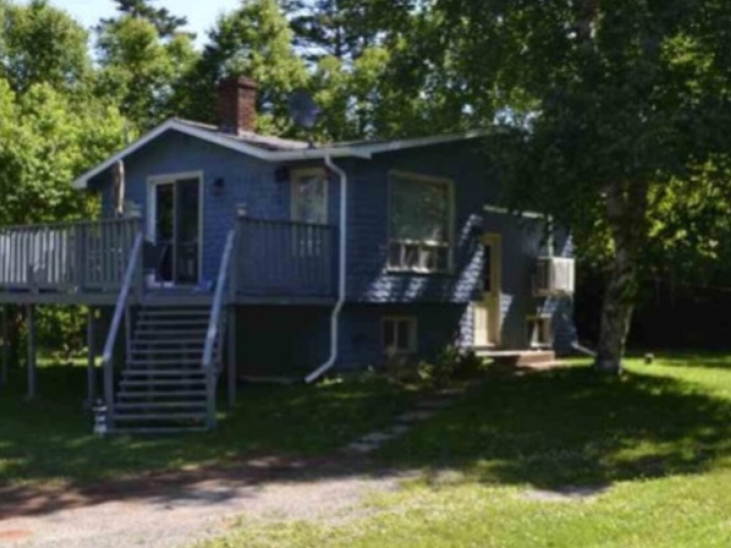 Little Blue Cottage by the Sea