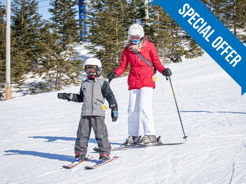 Adult and child on alpine ski hill, Brookvale with "Special Offer" graphic