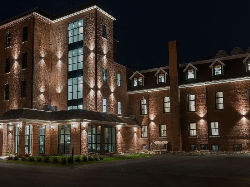 Exterior view of The Sydney Boutique Inn & Suites at night