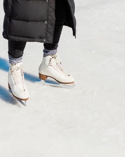Outdoor Skating, Prince Edward Island CLose-up of person wearing figure skates on outdoor rink