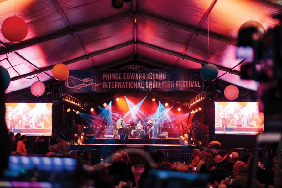 View of main stage musical entertainment from behind crowd at PEI International Shellfish Festival