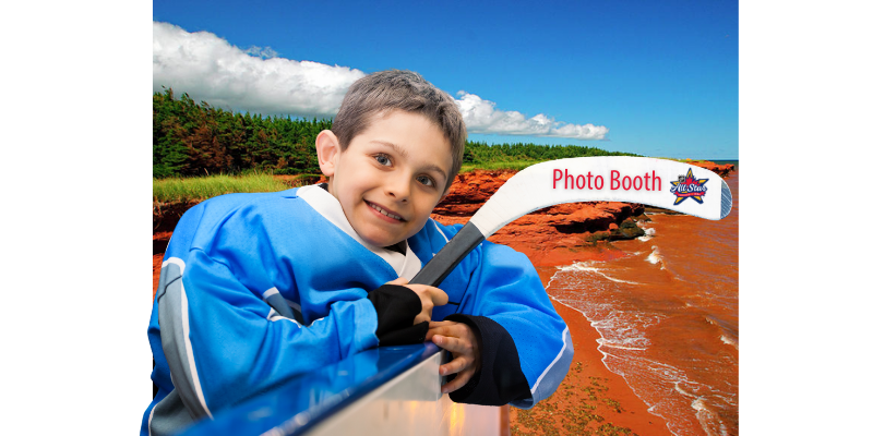 Hockey player at the boards with PEI beach shot in background