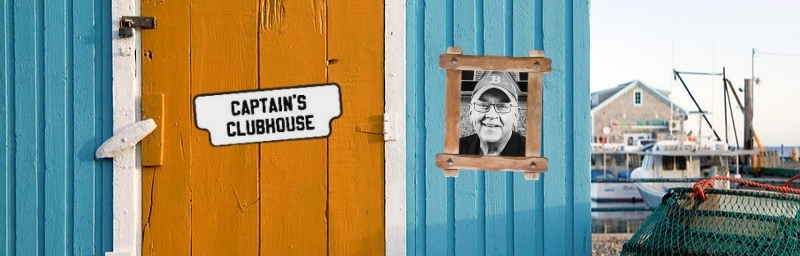 Fish shack with framed image of Kevin BOOMER Gallant and sign on door that reads Captain's Clubhouse