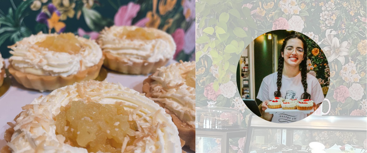 Staff member displays baked goods at front counter of Helen's Pastry Co.