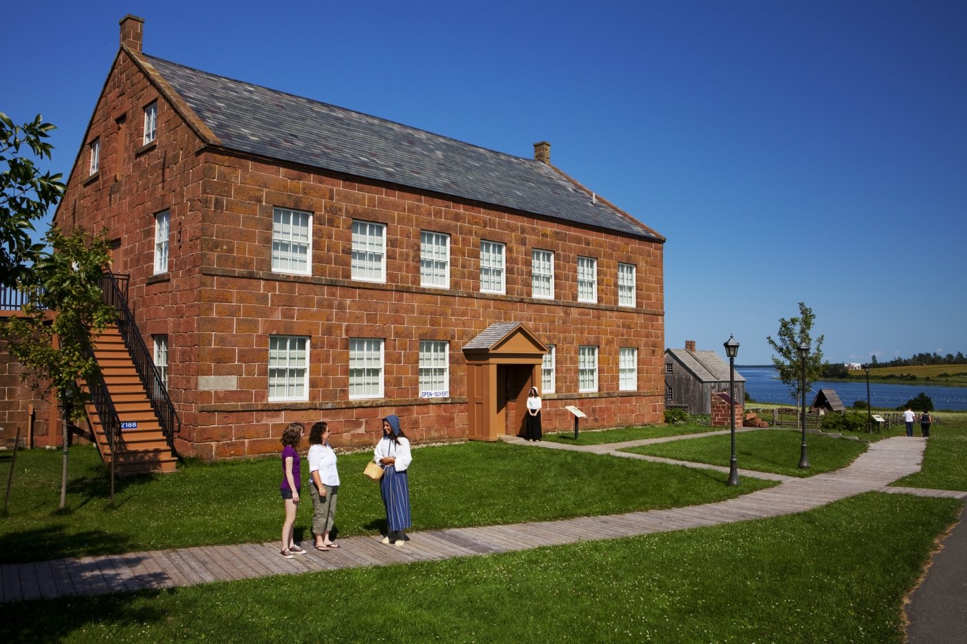 Farmer's Bank and Doucet House, South Rustico, in summer