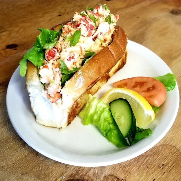 Lobsber roll on a white plate, Water Prince Corner Shop