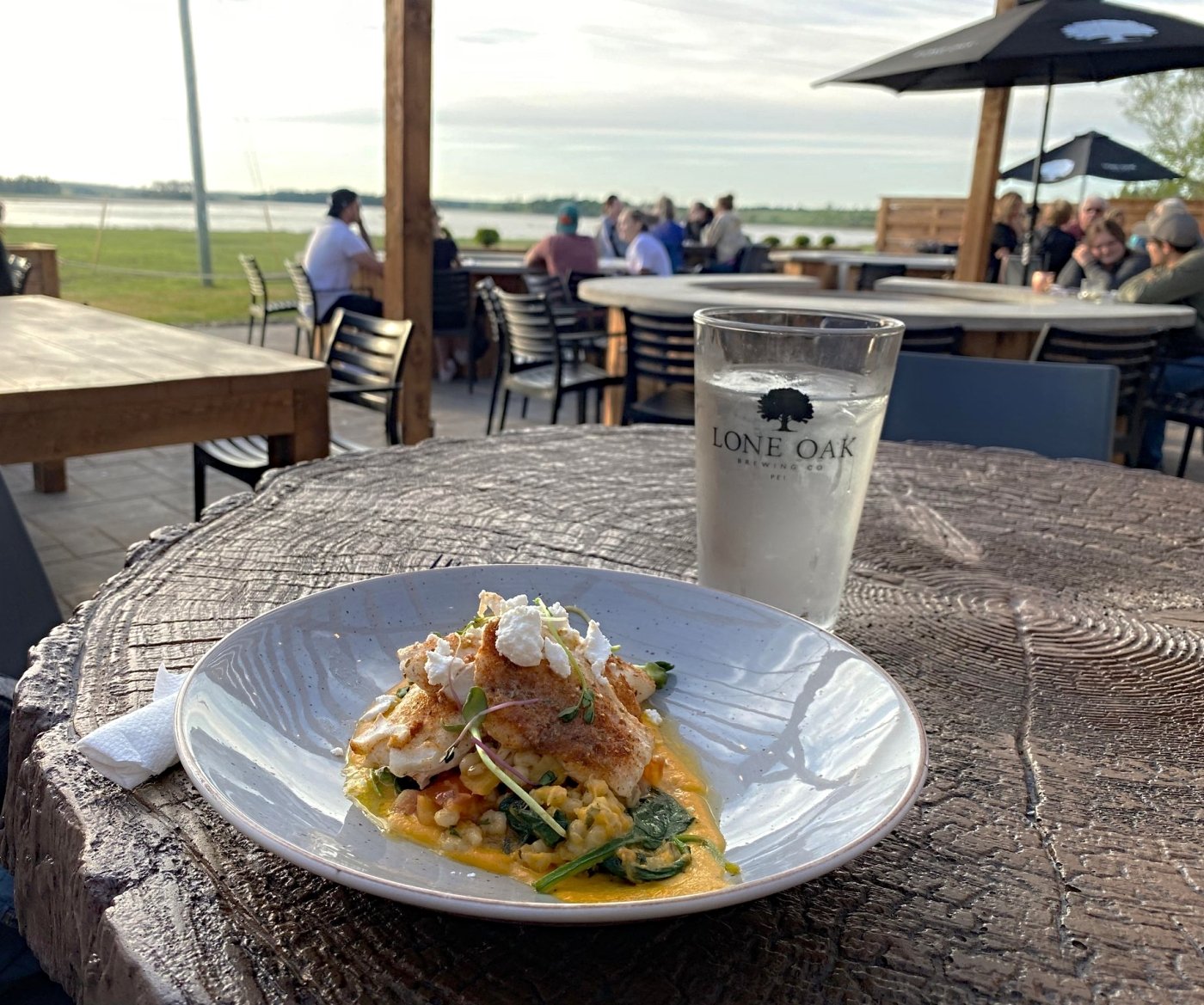 Meal on patio at Lone Oak Brewpub