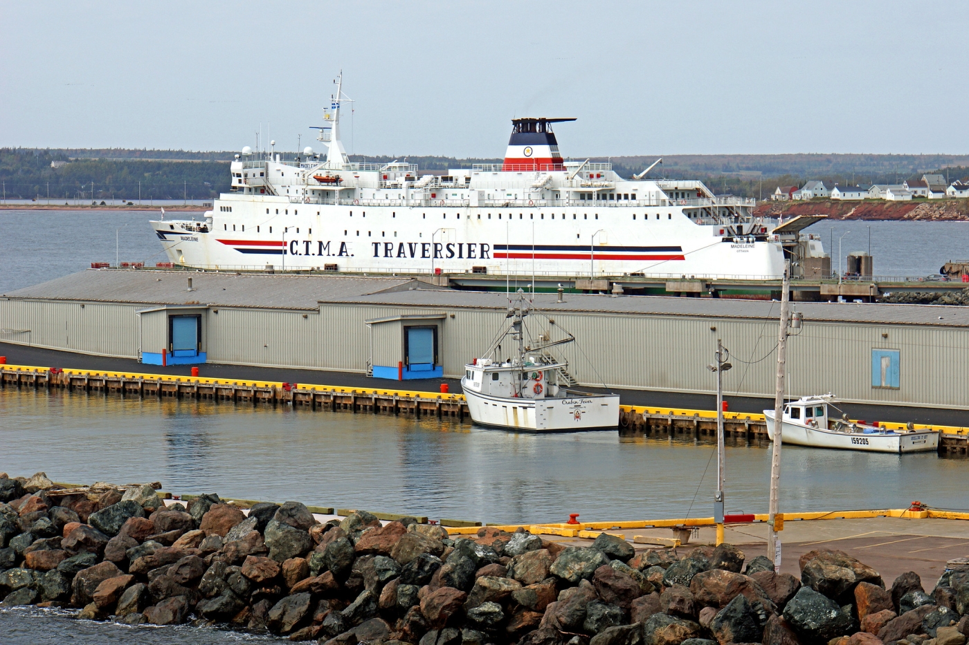 V Madeleinedocked in Souris, PEI with fishing boats in foreground