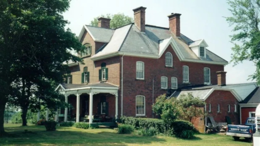 Outside view of the large brick house that is Glenaladale House