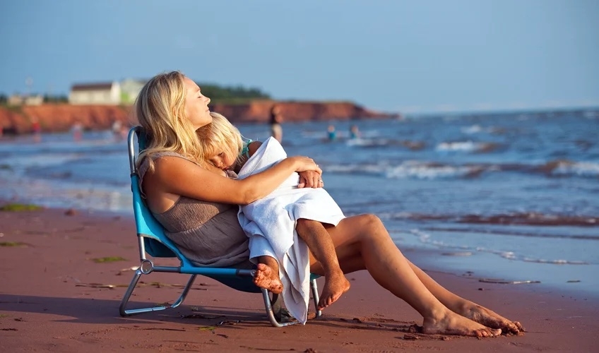 mother and daughter at the beach